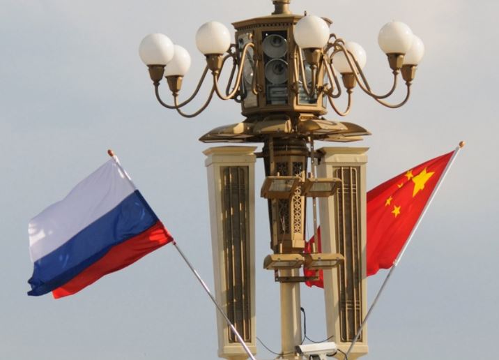 china russia flags (xinhua).jpg