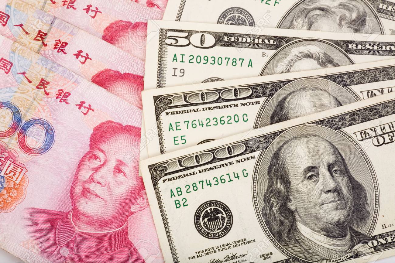 1753681-chinese-yuan-and-us-dollars-concept-of-exchange-war.jpg