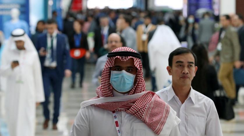 a_visitor_wears_a_mask_during_the_arab_health_exhibition_in_dubai_united_arab_emirates_january_29_2020._reuters.jpg