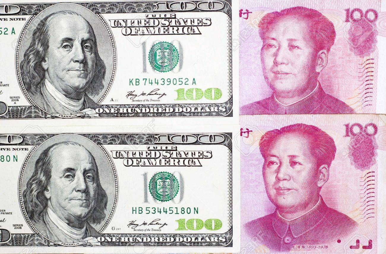 10347253-chinese-currency-yuan-and-u-s-dollars-amerkinaische-bills.jpg