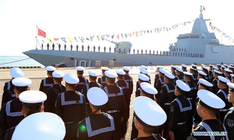 Photo taken on Jan. 12, 2020 shows the ceremony of the commissioning of the Nanchang, China's first Type 055 guided-missile destroyer, in the port city of Qingdao, east China's Shandong Province. The commission of Nanchang marks the Navy's leap from the third generation to the fourth generation of destroyers, according to a statement from the Navy. (Photo by Li Tang/Xinhua)
