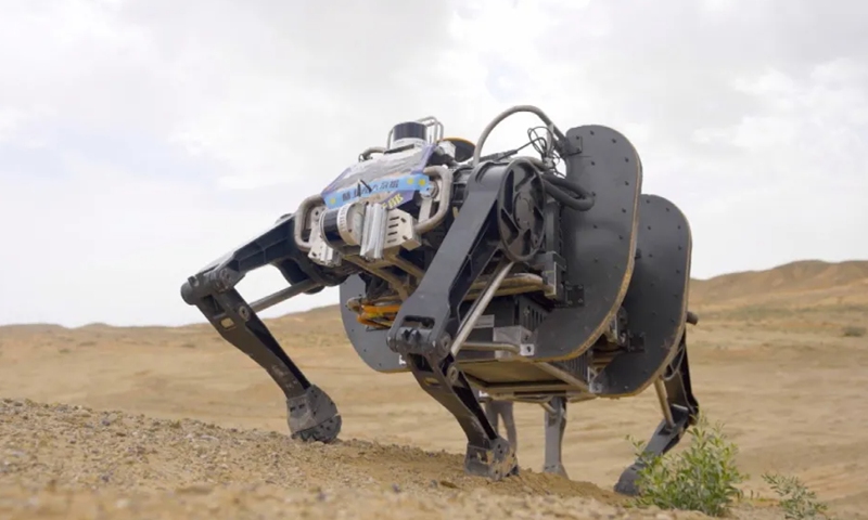 An electric-powered quadruped bionic robot independently developed by China displays its strong adaptative capability by operating in a desert. The robot, dubbed a mechanical yak, it the world's largest, heaviest and most off-road-capable of its kind. Photo: Screenshot from China Central Television