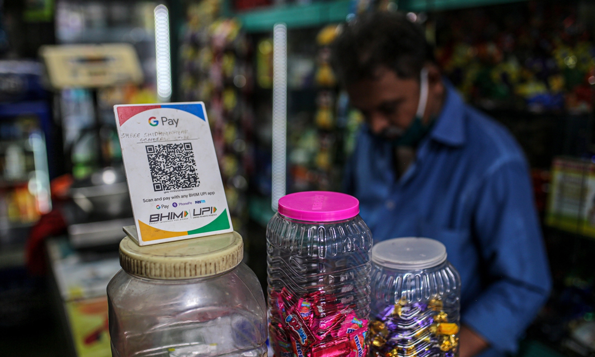 A general storel advertises the use of the Google Pay digital payment system in Mumbai, India, on July 17, 2021. Photo: VCG