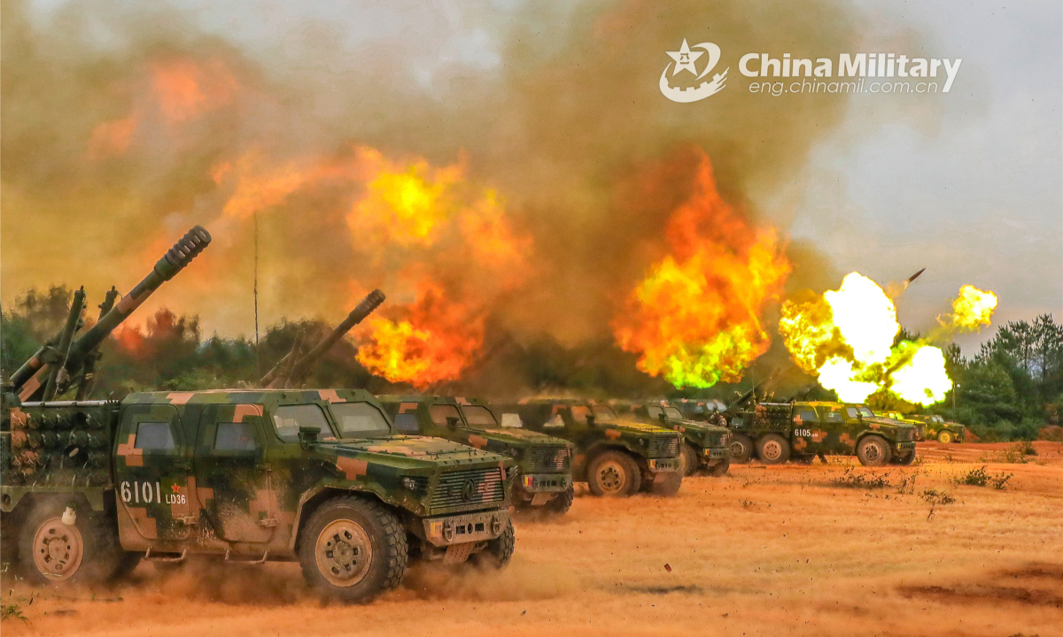 A line of vehicle-mounted howitzers attached to a combined-arms brigade with the army under PLA Eastern Theatre Command open fire during a live-fire exercise on June 16, 2022. Photo:China Military