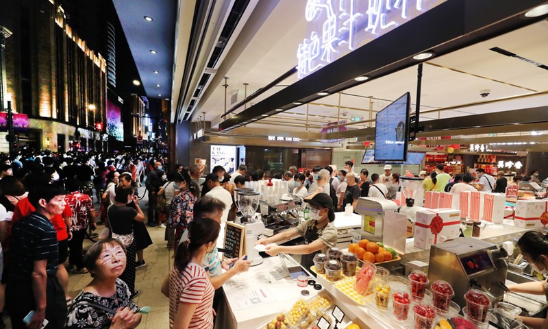 People visit a shop at the renovated East Nanjing Road Walkway in east China's Shanghai, Sept. 12, 2020.File Photo:Xinhua