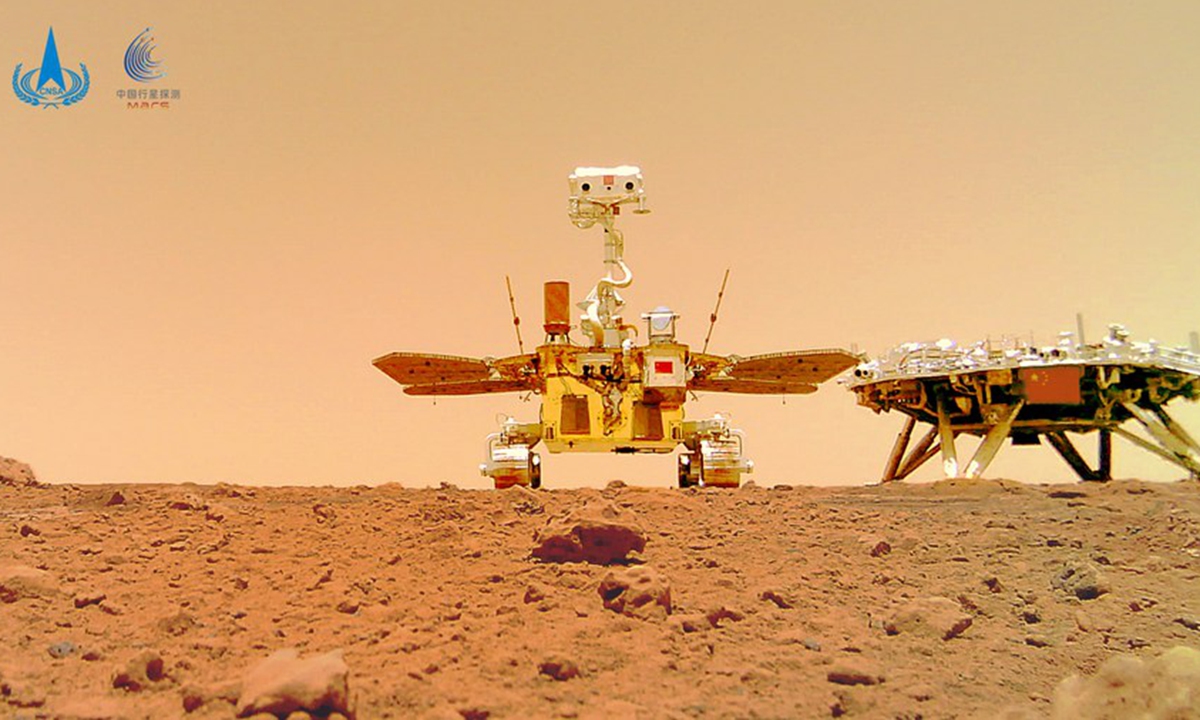 Photo released on June 11, 2021 by the China National Space Administration (CNSA) shows a selfie of China's first Mars rover Zhurong with the landing platform. (CNSA/Handout via Xinhua)
