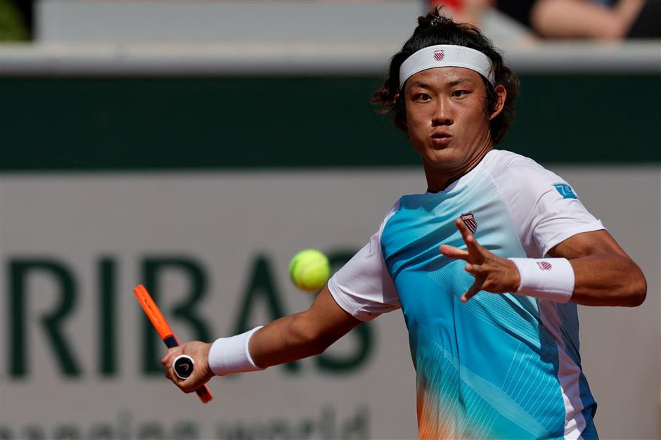Zhang, Wang prevail in winning day for China at Roland Garros