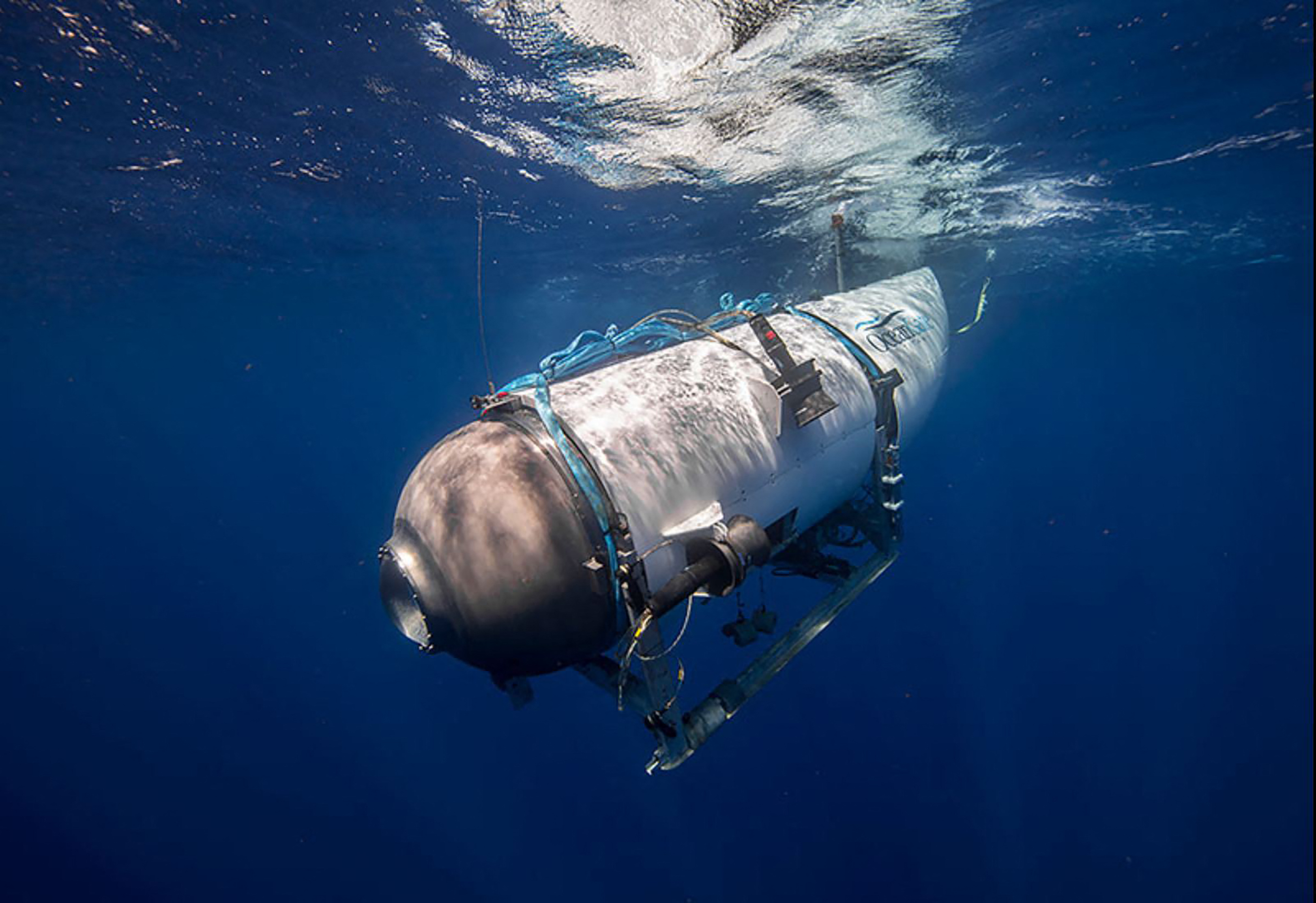 Search area for lost Titanic-bound submersible deepens, doubles in