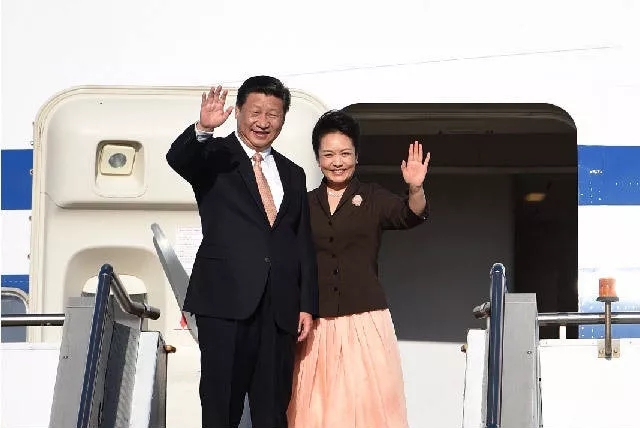 Xi Jinping and Peng Liyuan wrap up their visit to Australia on November 19, 2014. [File Photo: CCTV]