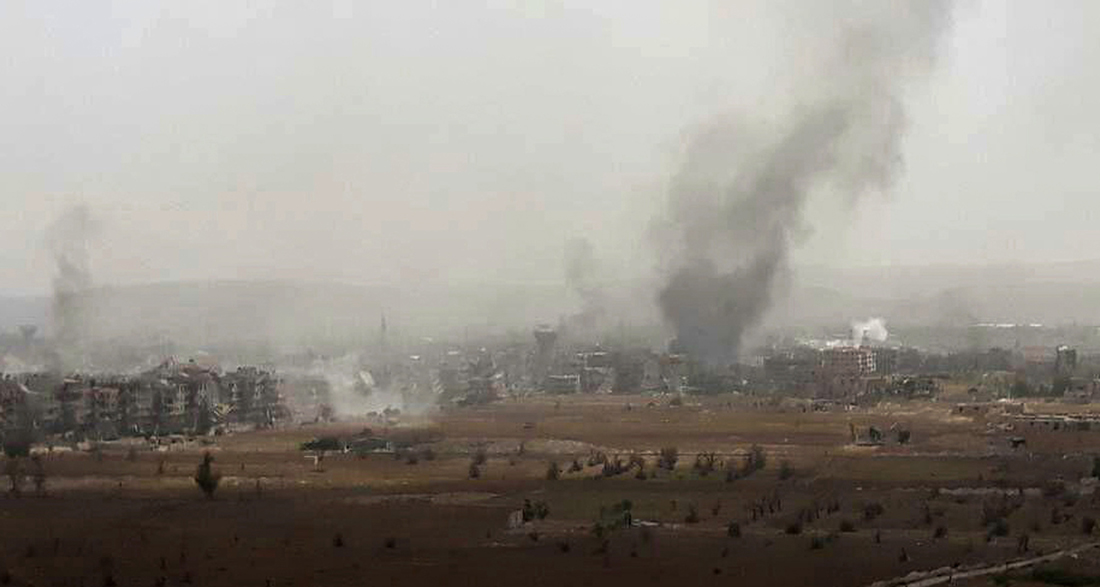 In this photo released by the Syrian official news agency SANA, smoke rises after Syrian government airstrikes and shelling hit in Hajar al-Aswad neighborhood held by Islamic State militants, southern Damascus, Syria, Thursday, May 3, 2018. [File Photo: AP]