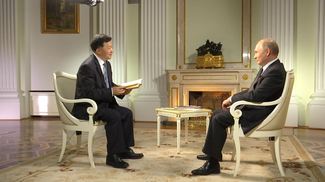 Russian President Vladimir Putin has an exclusive interview with Shen Haixiong, president of China Media Group. [Photo: cri.cn]