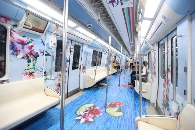 Corridors of Subway Line 2 in Xi'an, Shaanxi Province, are painted with ancient Tang Dynasty motifs at the line's launch, June 18, 2018. [Photo: xiancn.com]