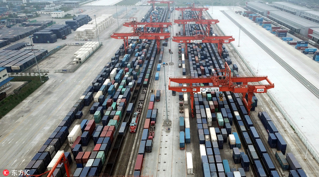 Cargo containers shipped by freight trains of the China-Europe Railway Express are stacked at the Chengdu Railway Port Multimodal Transport Customs Supervision Center in Qingbaijiang district in Chengdu, southwest China's Sichuan province, 3 June 2018. [Photo: IC]