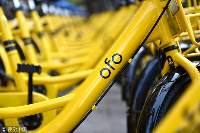 China-based ofo announced on Monday to suspend its bike-share scheme in U.S. third biggest city Chicago due to controversial locking rules. [File Photo: VCG]