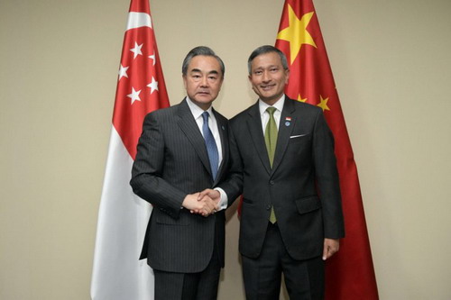 Chinese State Councilor and Foreign Minister Wang Yi meets with his Singaporean counterpart Vivian Balakrishnan in Singapore on Wednesday, August 1, 2018. [Photo: fmprc.gov.cn]