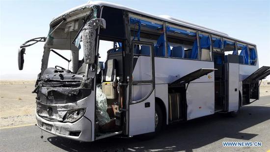 A damaged bus is seen at the site of a suicide blast in Pakistan's southwestern Balochistan province on Aug. 11, 2018. A suicide attack injured six people including three Chinese workers here on Saturday, the Chinese Embassy to Pakistan said. (Xinhua/Stringer)