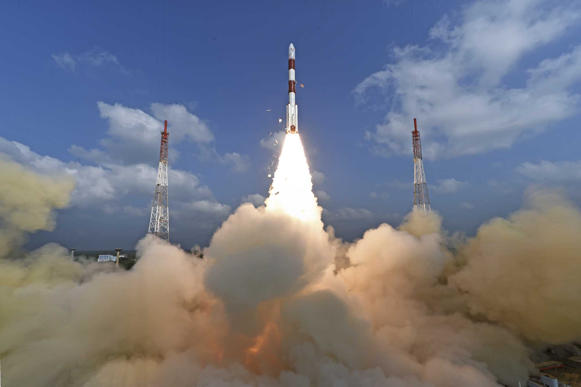 This photograph released by Indian Space Research Organization shows its polar satellite launch vehicle lifting off from a launch pad at the Satish Dhawan Space Centre in India, Wednesday, Feb.15, 2017. [Photo: Indian Space Research Organization via AP]