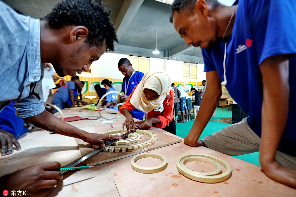 Staff from Africa work in a factory. [File Photo: IC]