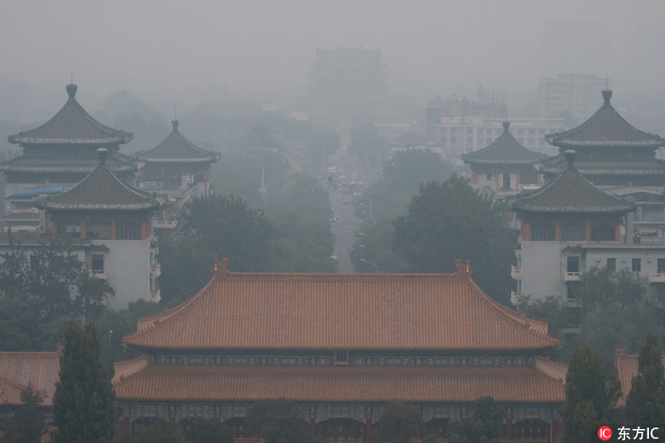 The Palace Museum, also known as the Forbidden City, is seen vaguely in heavy smog in Beijing, China, 15 October 2018. [Photo: IC]