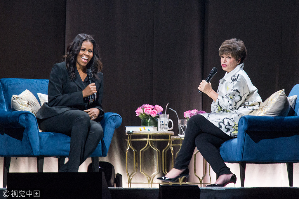 Former First Lady Michelle Obama (L) appears onstage with former senior advisor to President Barack Obama Valerie Jarrett at Becoming: An Intimate Conversation with Michelle Obama at the Capital One Arena in Washington, Saturday, Nov. 17, 2018. [Photo: Polaris/Erin Scott]