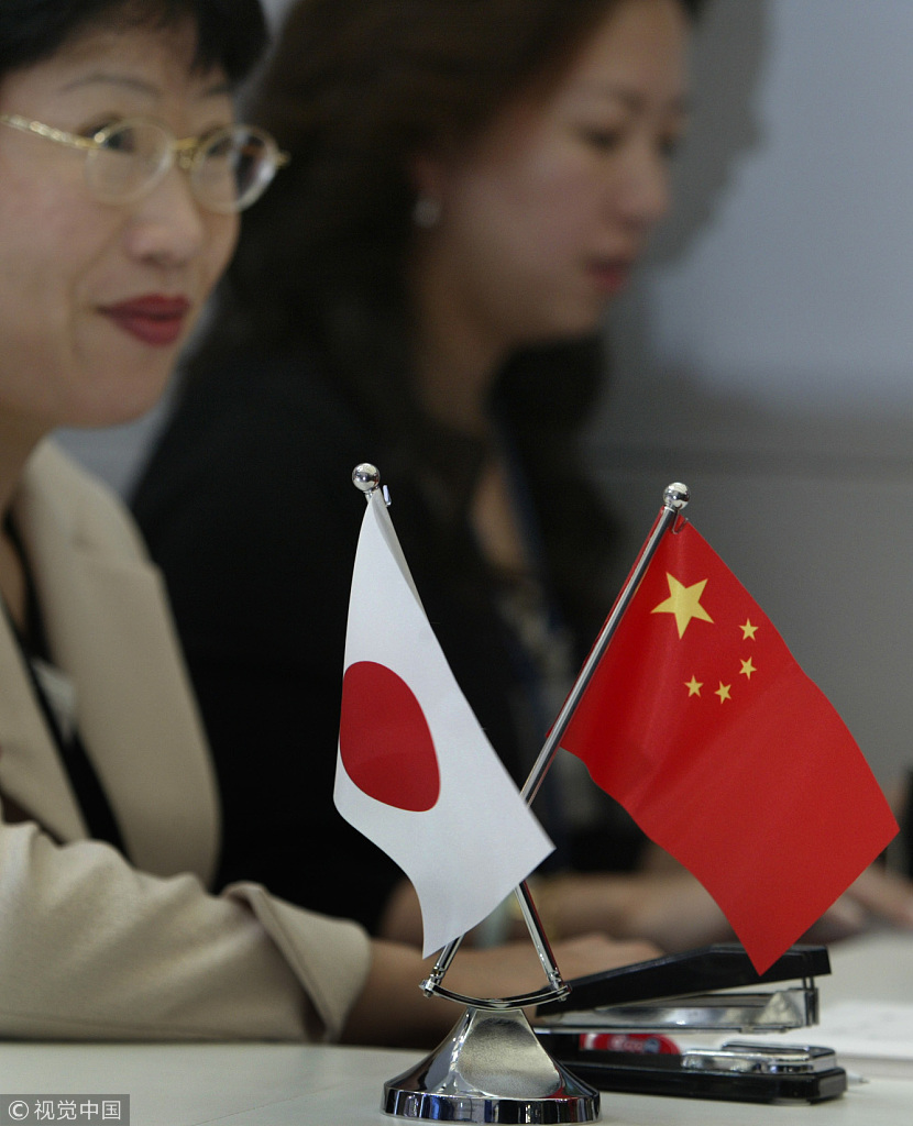 China and Japan on Sunday signed cooperation agreements for 24 projects in areas including energy conservation, new energy development and pollution control.[File Photo: VCG]