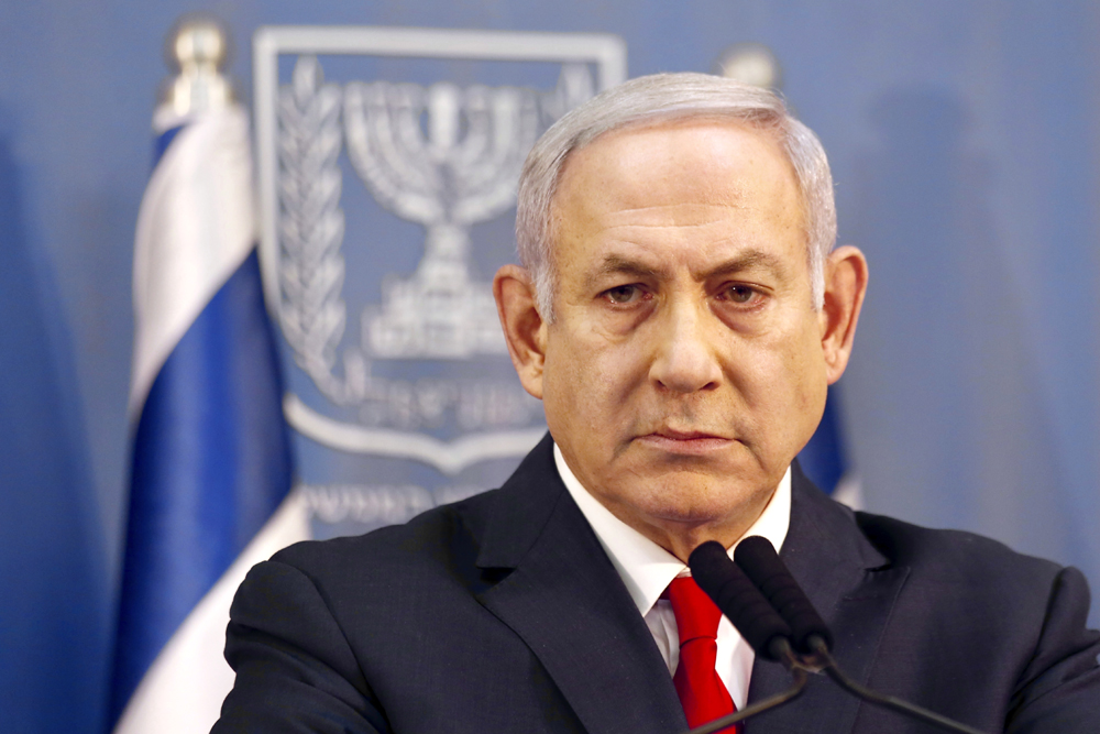 Israeli Prime Minister Benjamin Netanyahu delivers a statement in Tel Aviv, Israel, Nov. 18, 2018. [Photo: AP/Ariel Schalit]