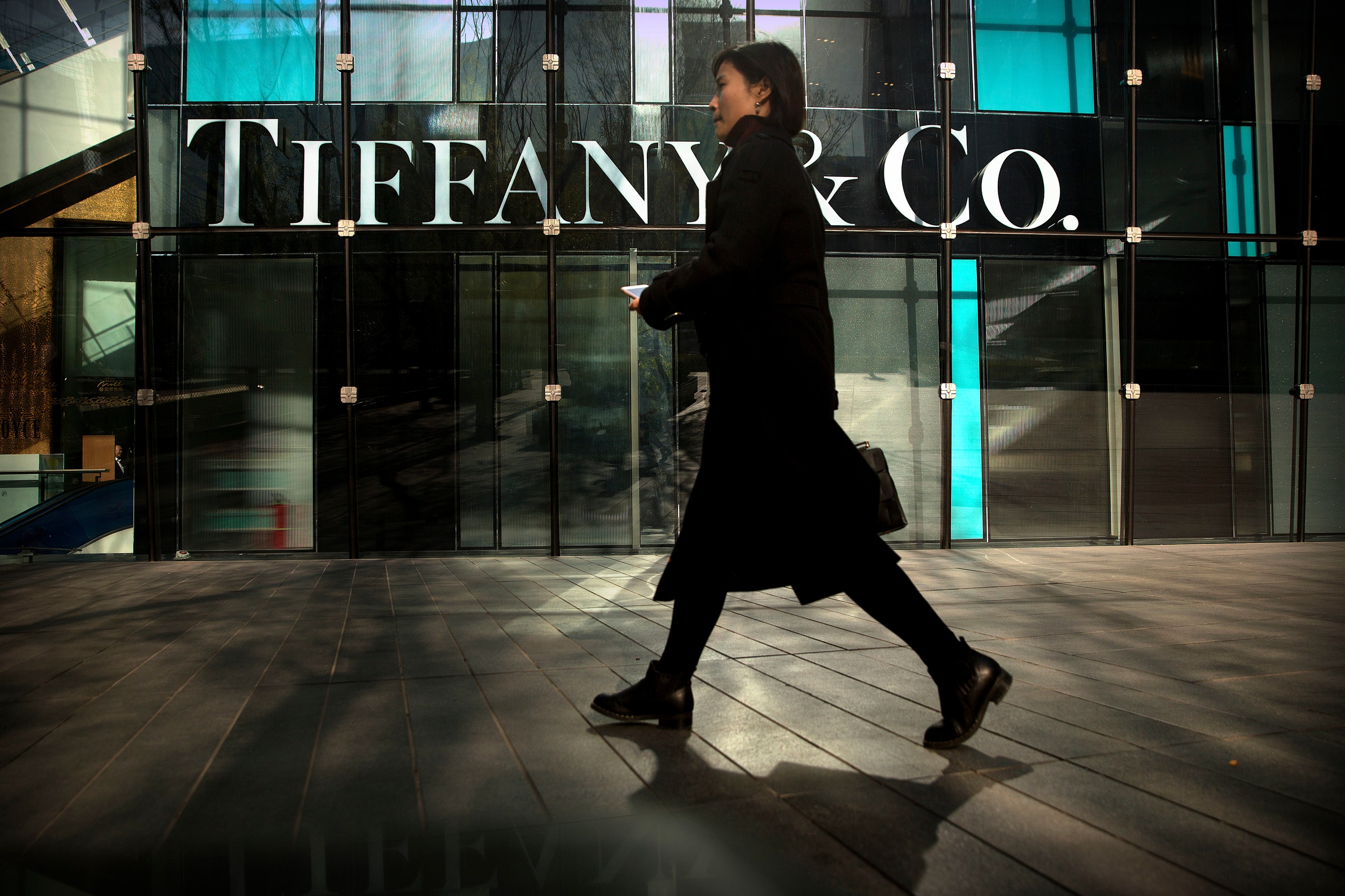 A pedestrian walks past a Tiffany & Co. store at a shopping mall in Beijing, November 29,2018.[Photo:IC]