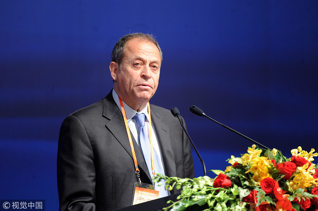 Stephen Perry, the president of 48 Group Club, delivers speech at the World Trade Promotion Summit in Beijing, May 15, 2012. [Photo: VCG]