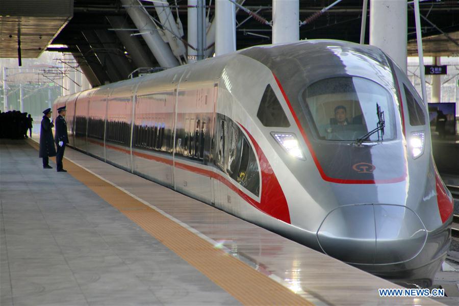 A high speed train sets off from Jinan East Railway Station, east China's Shandong Province, Dec. 26, 2018. The Jinan-Qingdao high speed railway which started operation on Wednesday will shorten the travel time between the two cities from 140 minutes to 100 minutes.[Photo:Xinhua]