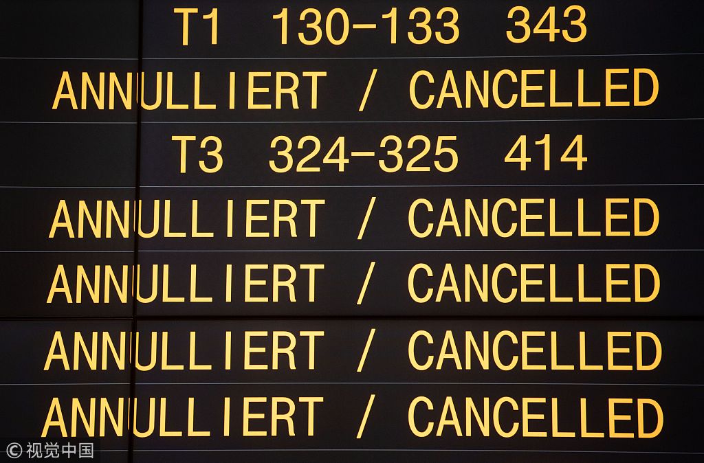 A board displays cancelled flights during a one-day strike by security staff at Stuttgart's airport on January 10, 2019. [Photo: VCG]