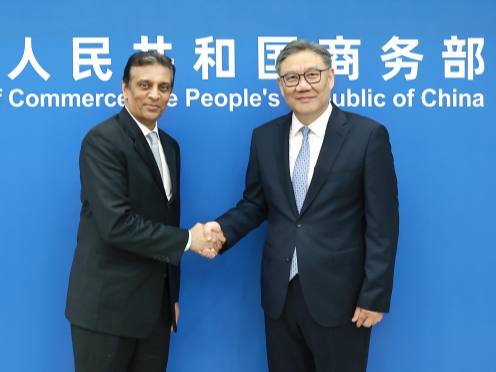 Chinese commerce minister urges US to meet China halfway on trade ties