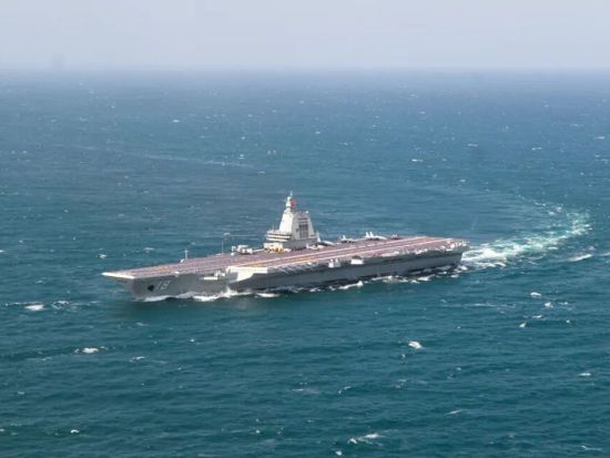 Aircraft carrier Fujian formation conducts first live-force training at sea