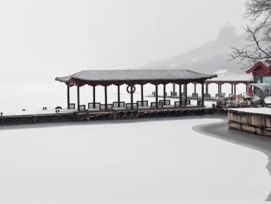 First snow settles over Summer Palace