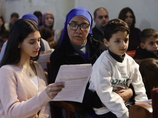 Gaza Christians hold first Christmas Mass in two years as war's shadow lingers