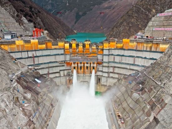 China's highest-altitude arch dam hydropower station begins operating first generating units
