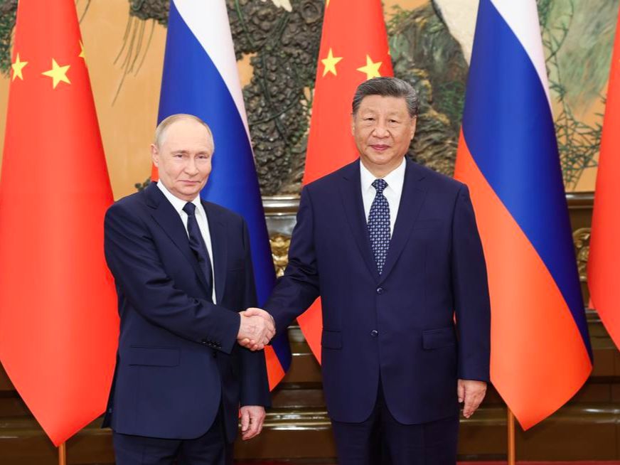 Xi, Putin exchange New Year greetings