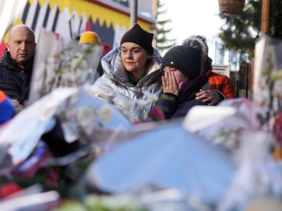 Six people injured in the fatal fire at a Swiss bar remain unidentified. It's an unbearable wait