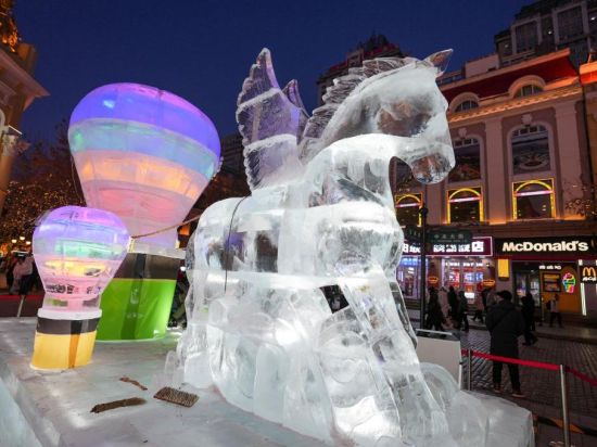 Ice sculptures transform Harbin's century-old Central Street into glittering winter wonderland