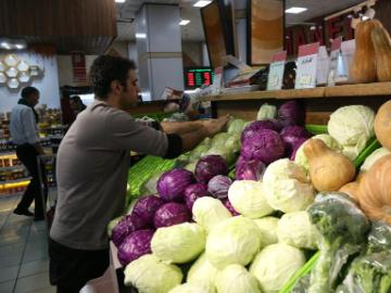 People shop at supermarket in Tehran, Iran