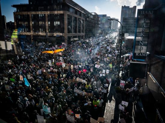 Protesters brave freezing temperatures in Minneapolis to demand 'ICE Out'