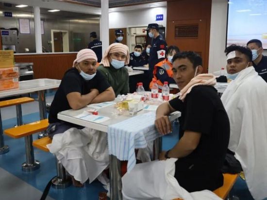 China hands over 17 Filipino sailors from shipwreck to Philippines