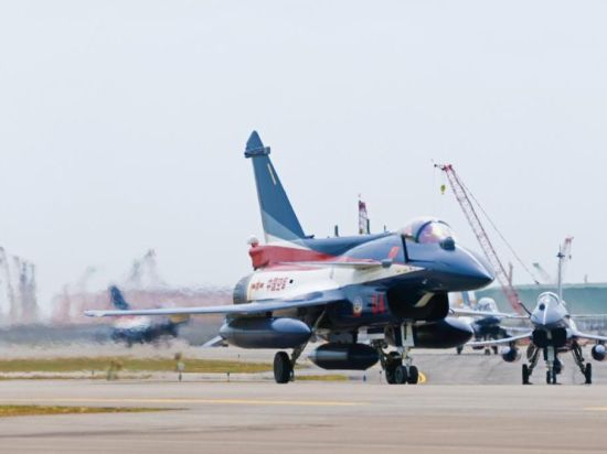 Chinese PLA aerobatic team's J-10 jets arrive in Singapore for airshow