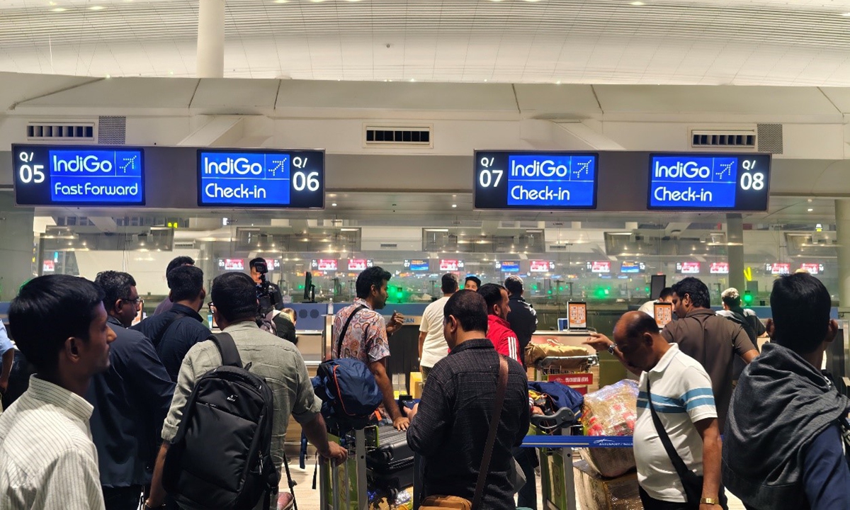 The first batch of passengers taking the resumed China-India direct flight after a five-year hiatus check in their luggage and prepare to depart for Guangzhou on October 26, 2025. Photo: Courtesy of Indigo