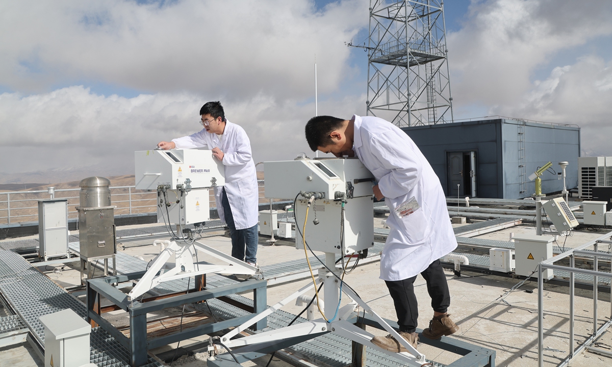 Staff members inspect measuring equipment at the Waliguan Baseline Observatory in Northwest China's Qinghai Province on February 5, 2026.
