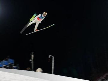 Austria wins inaugural Olympic men's ski jumping super team gold