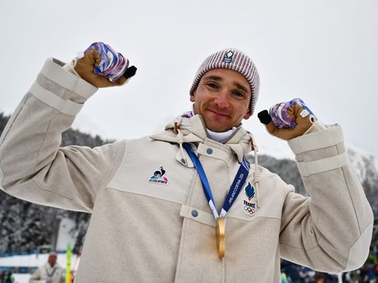 France rallies from last to claim historic Olympic men's biathlon relay gold