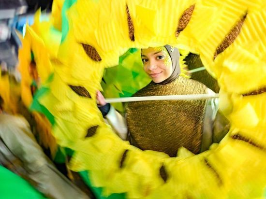 Costumed revelers perform in evening carnival in Strumica, North Macedonia