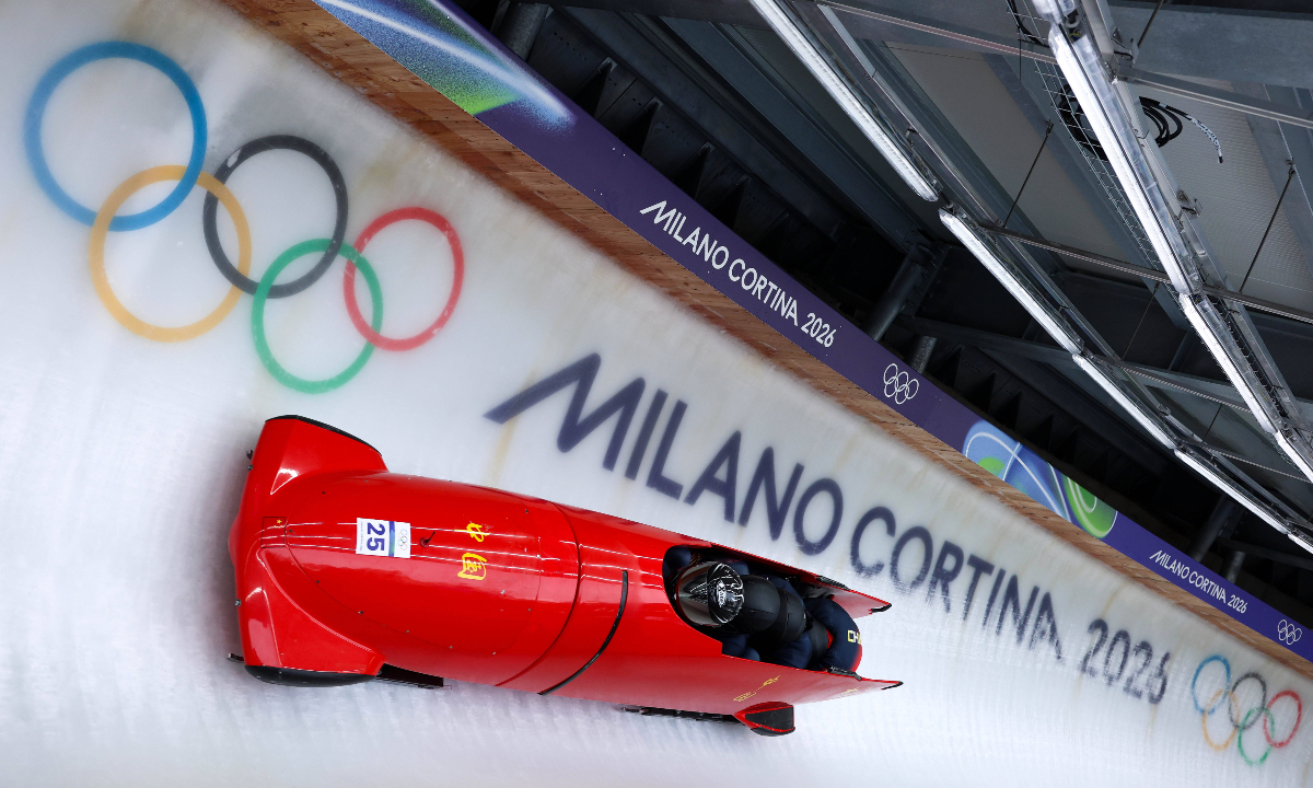 Chinese athletes Sun Kaizhi, Zhang Jin, Shi Yaolong and An Tai compete in the men’s 4-man bobsleigh competition on February 21, 2026 at the Cortina Sliding Centre in Cortina, Italy during the Milano Cortina 2026 Winter Olympics. Photo: VCG