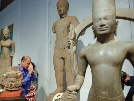 Cambodia welcomes back dozens of artifacts looted by UK trafficker