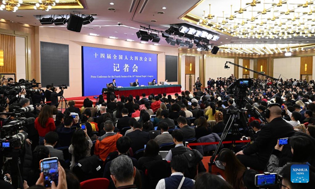 Chinese Foreign Minister Wang Yi, also a member of the Political Bureau of the Communist Party of China Central Committee, attends a press conference on China's foreign policy and external relations on the sidelines of the fourth session of the 14th National People's Congress (NPC) in Beijing, capital of China, March 8, 2026. (Xinhua/Cao Yiming)